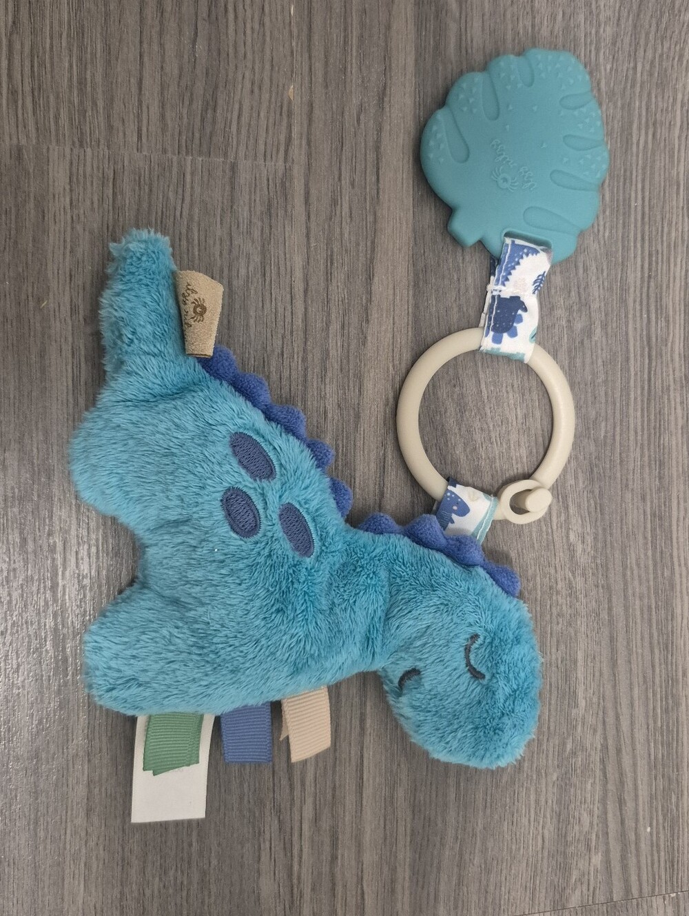 *5/$25* Itzy Ritzy Itzy Pal™ Plush + Teether in the Dino design (James)